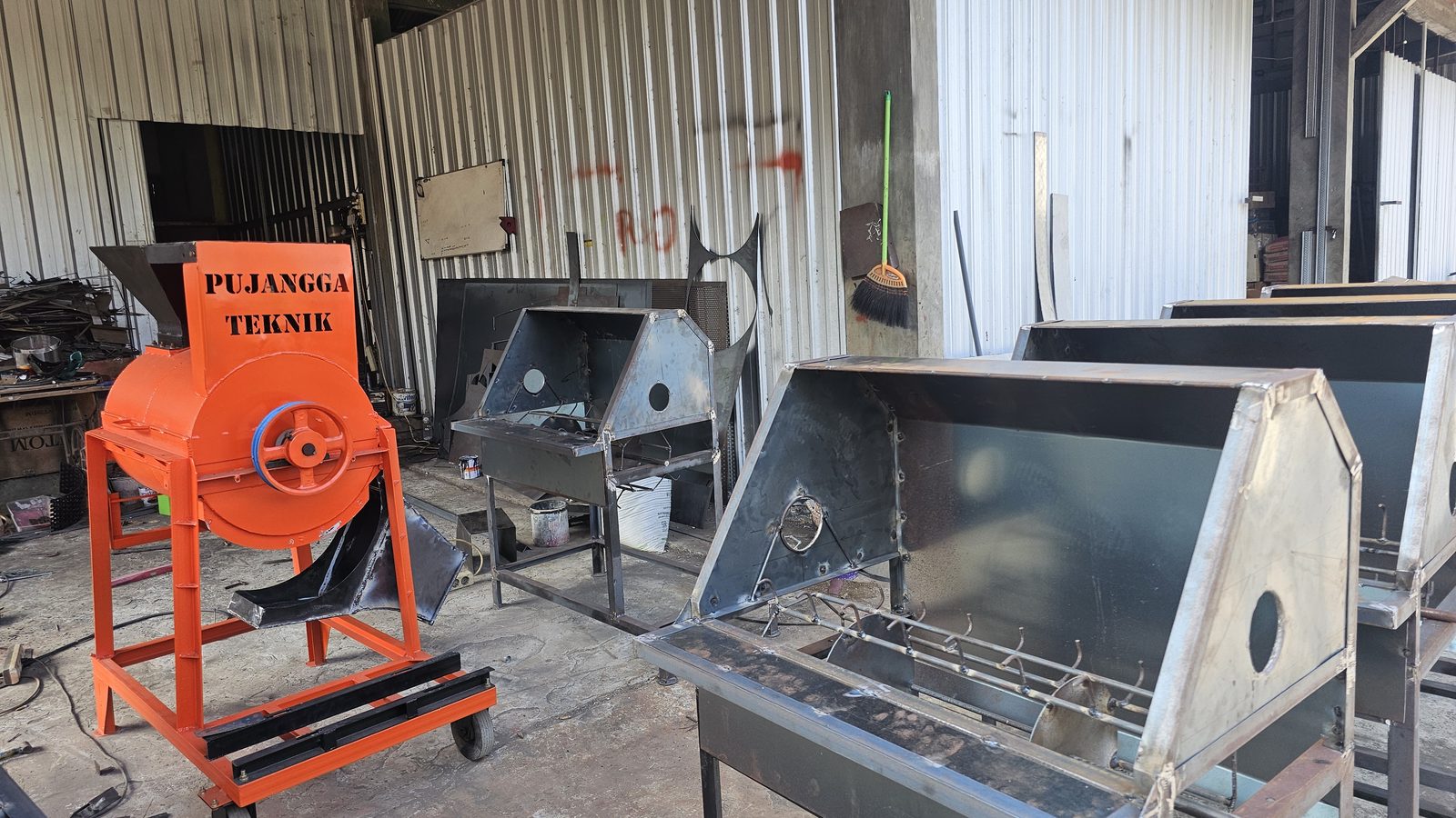 Pujangga Teknik workshop in Malang, Indonesia — rice thresher units in production